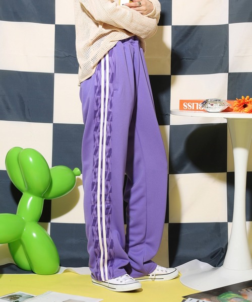 NERDY スウェットパンツ ジャージ シンボルパターンブロックトラック