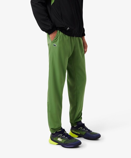 ラコステ トラックパンツ 総柄 サイドライン ワニロゴ ジャージ M 緑 人気 LACOSTE（ラコステ）の「サイドテーピングモノグラムジャカード