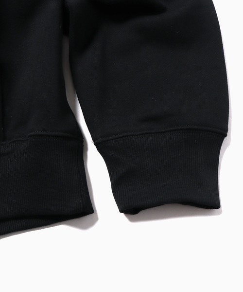 「JUNGLES」 プルオーバーパーカー X-LARGE ブラック メンズの画像