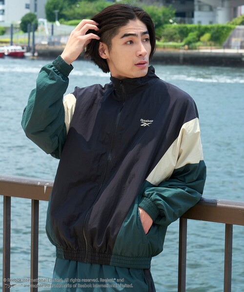 【希少デザイン】 Reebokリーボック ナイロンジャケット 80s　補修アリ Reebok（リーボック） ナイロンジャケット 別注トラックジャケット
