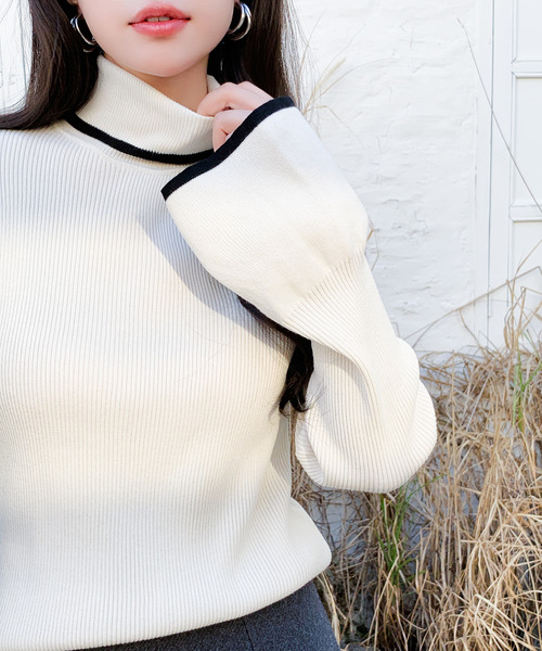 ニット セーター デザイン性のあるアイテム。配色フレアスリーブ