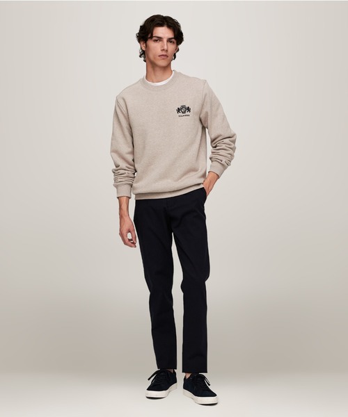 【トミーヒルフィガー】【オンライン限定】エンブロイダリーカレッジロゴスウェット TOMMY HILFIGER（トミーヒルフィガー）の「【オンライン限定