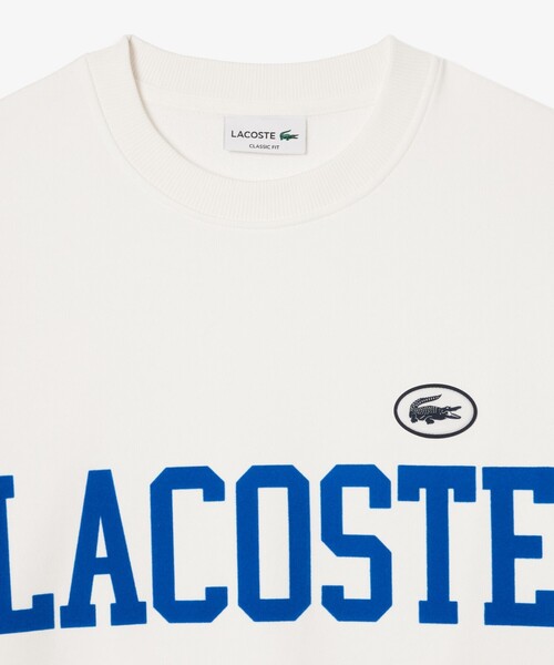 LACOSTE フロッキーロゴスウェットシャツ LACOSTE トレーナー スウェット フロッキーカレッジロゴクルー