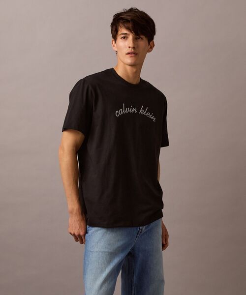 関税込   Jeans グラフィック Tシャツ ユニセックス Calvin Klein tシャツ 「ユニセックス」グラフィック Tシャツ