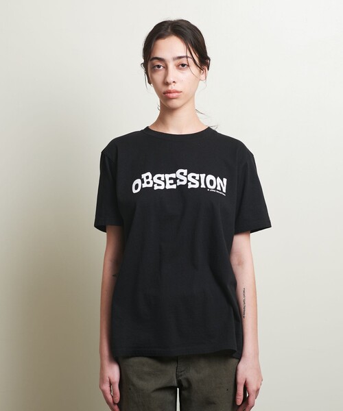 tシャツ 「John Holmstorm×ATTISESSION」OBSESSION Tシャツ レディース ATTISESSION tシャツ 「John Holmstorm×ATTISESSION」OBSESSION