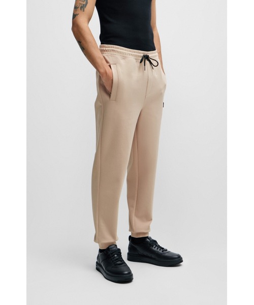 HUGOリラックスフィットカーゴスウェットパンツ NALEVA ドローコード HUGO スウェットパンツ ジャージ ストレッチコットン トラックスーツ
