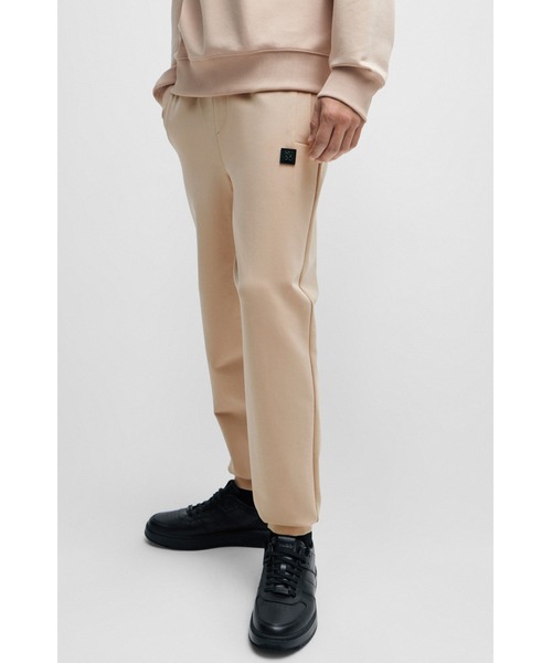 HUGOリラックスフィットカーゴスウェットパンツ NALEVA ドローコード HUGO スウェットパンツ ジャージ ストレッチコットン トラックスーツ