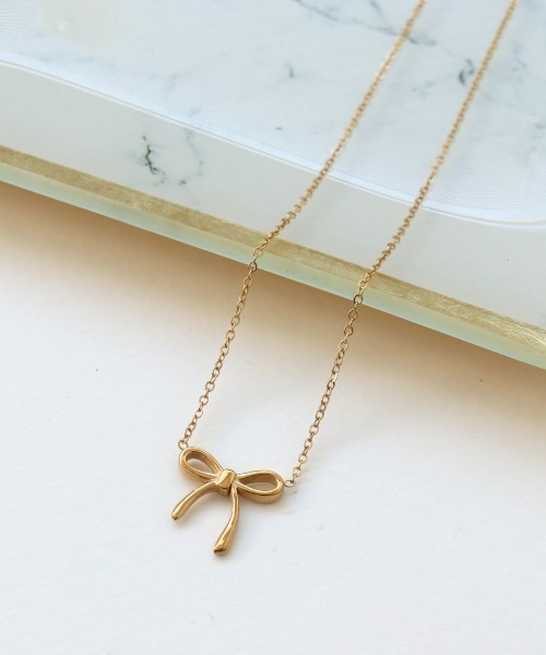Three Four Time（スリーフォータイム） ネックレス リボンステンレス