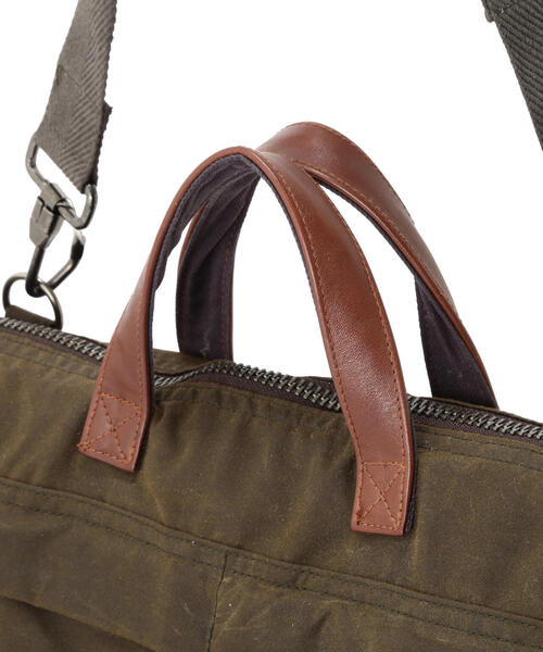ショルダーバッグ MILITARY FABRIC OILED CLOTH HELMET BAG / ミリタリー ファブリック クロス ヘルメットバッグの画像