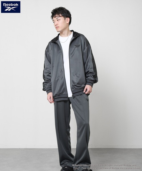 Reebok（リーボック） パンツ トラックパンツ / ジャージ ライン柄