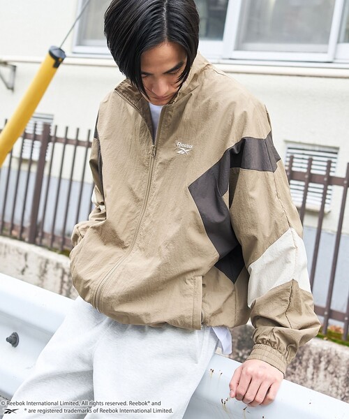 Reebok/ナイロンジャケット アイボリー 新品 新色追加【10%OFF】【Reebok/リーボック】 別注スモールベクター刺繍裾