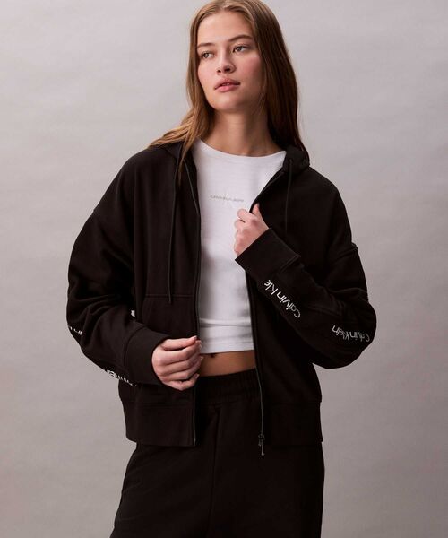 Calvin Klein（カルバン・クライン） パーカー ロゴテープテリー