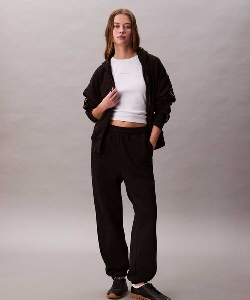 Calvin Klein（カルバン・クライン） パーカー ロゴテープテリー